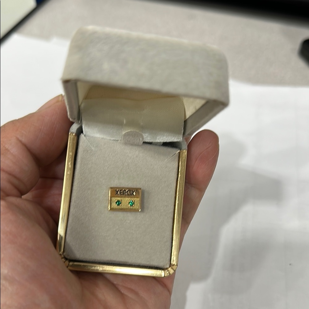 Gold and Green Jewelry Piece